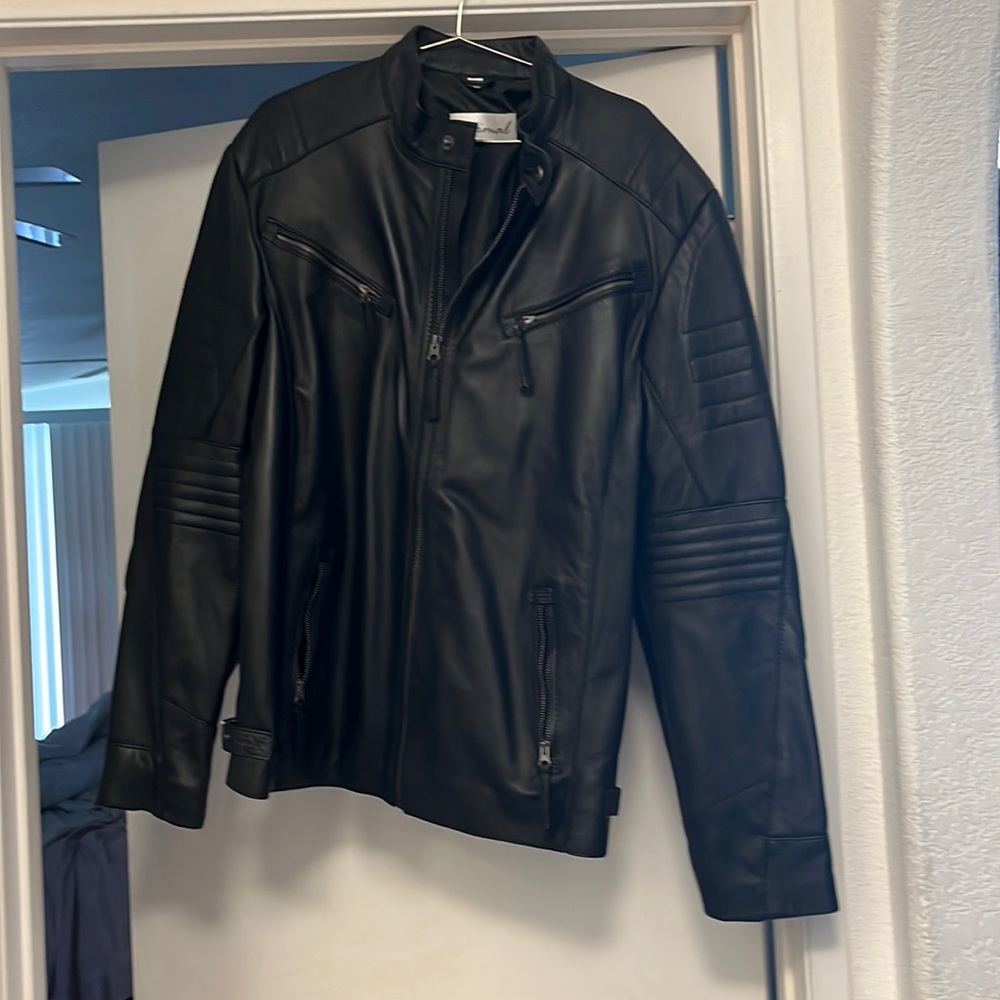 Soft leather biker jacket XL but fits like a large never worn